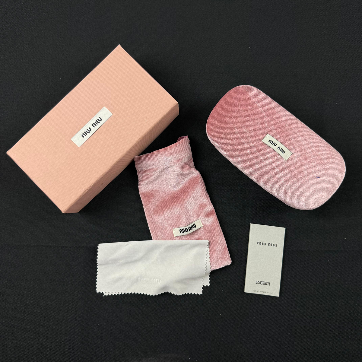 Óculos de Sol Miu Miu 8142